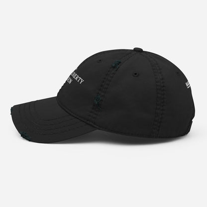 The Liberty Den Distressed Dad Hat (light logo)